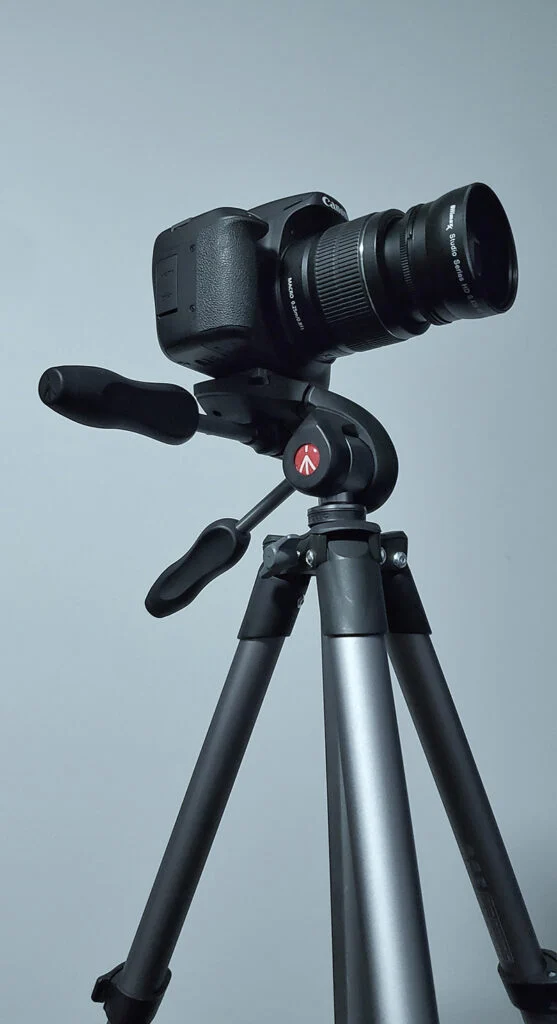camera on a tripod for product photography of jewelery