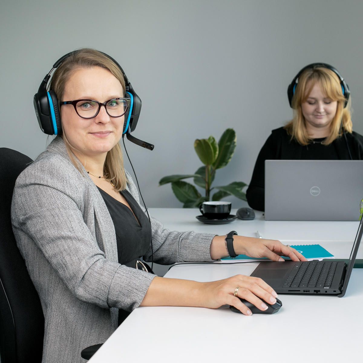 person wearing headphones at the computer