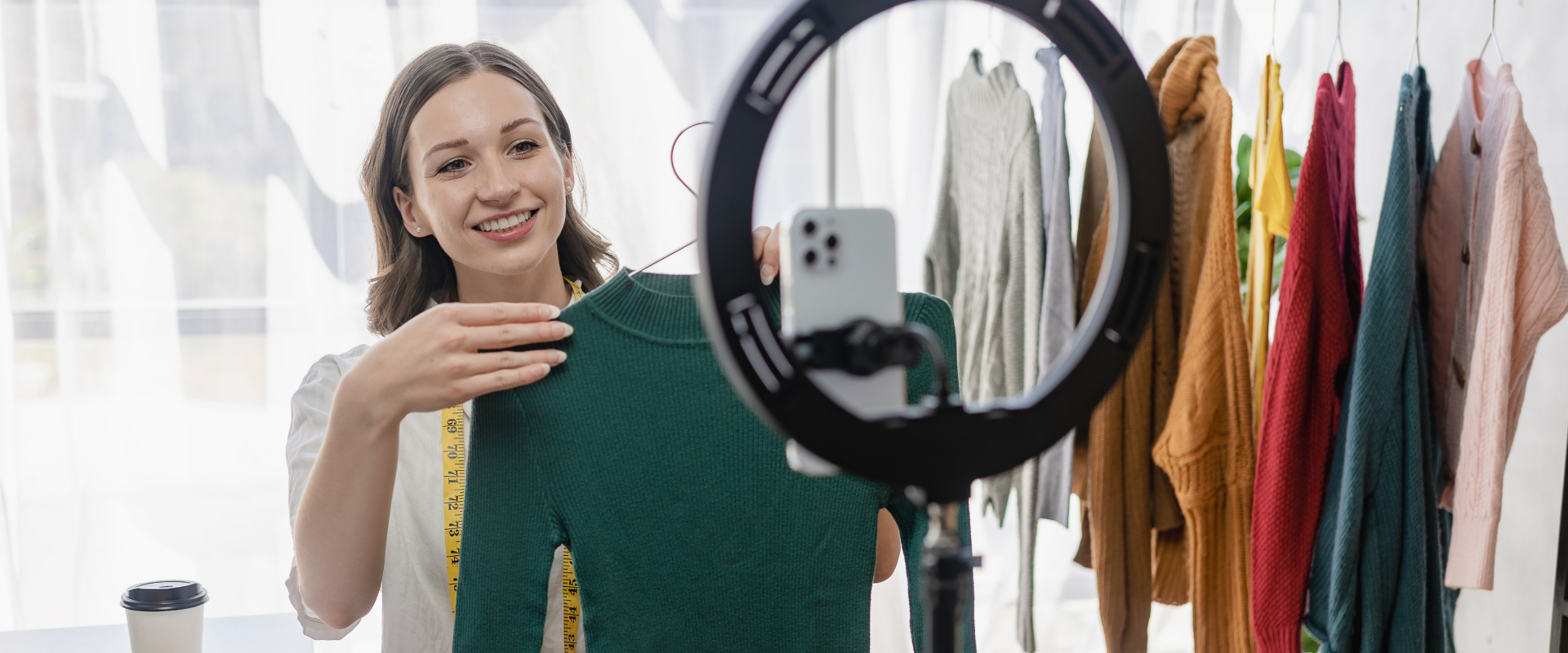  Livestream shopping example: a person is showing off a piece of clothing